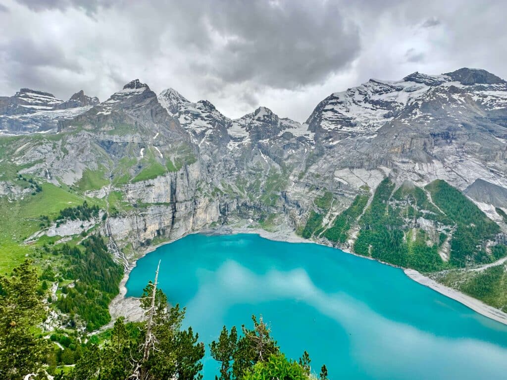 Oeschinensee Lake, waterfalls, and mountains