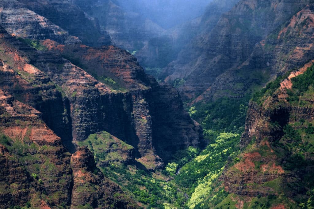 Rain blows down Waimea Canyon