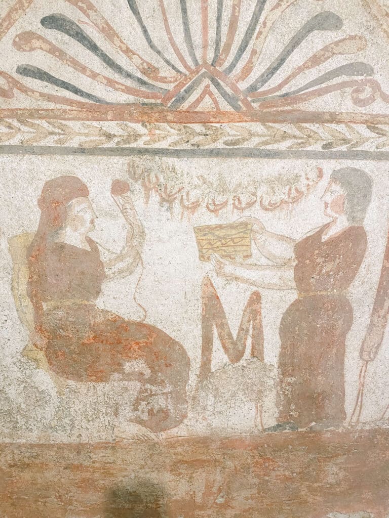 Frescos at Paestum. A woman with a basket.
