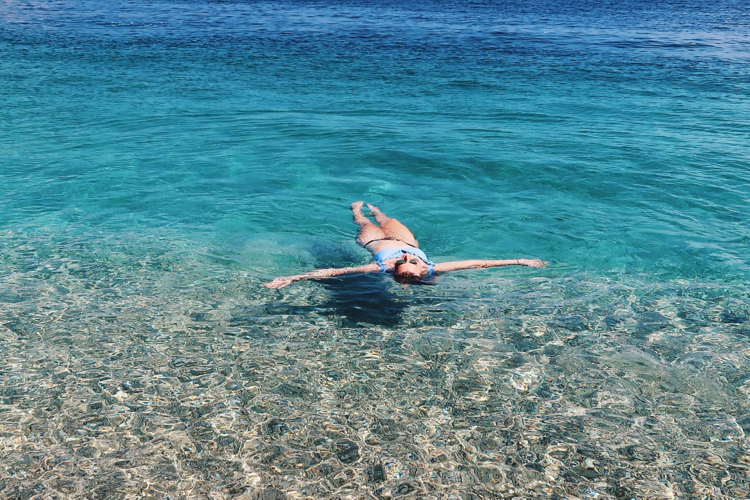 Floating in the crystal blue water of the Adriatic Sea, Croatia