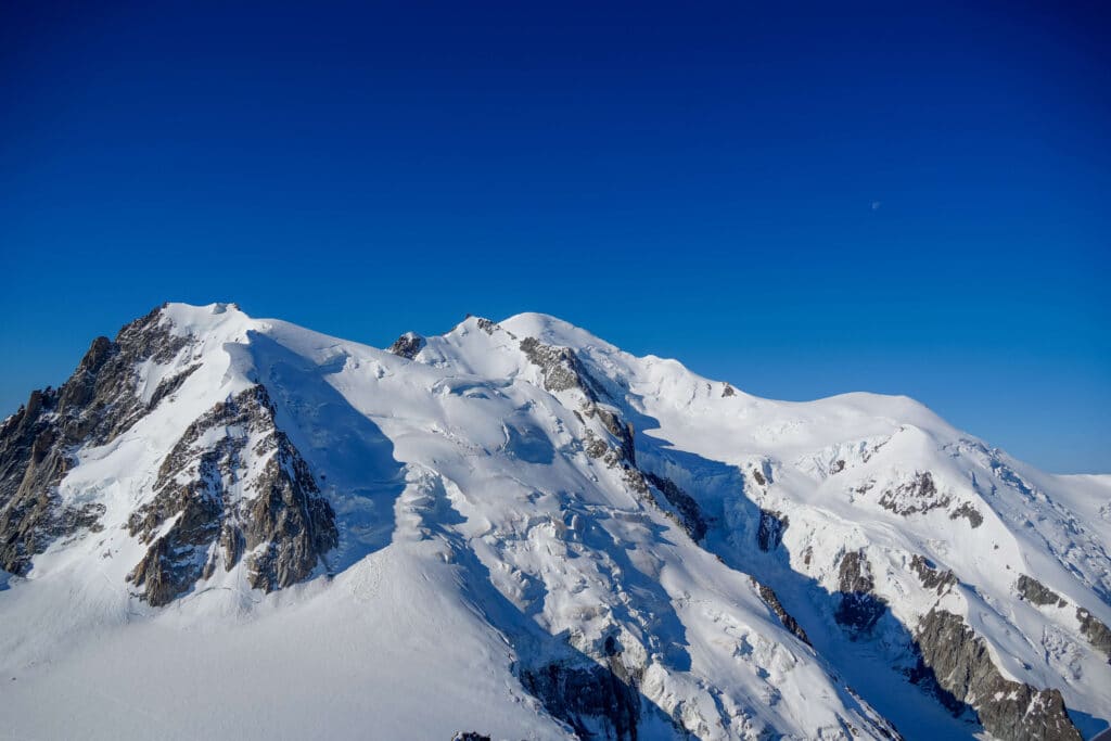 The Mont Blanc summit against a blue sky