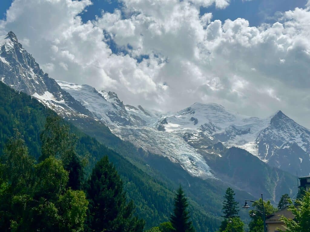 Snow-dusted Mont Blanc massif seen through dramatic clouds