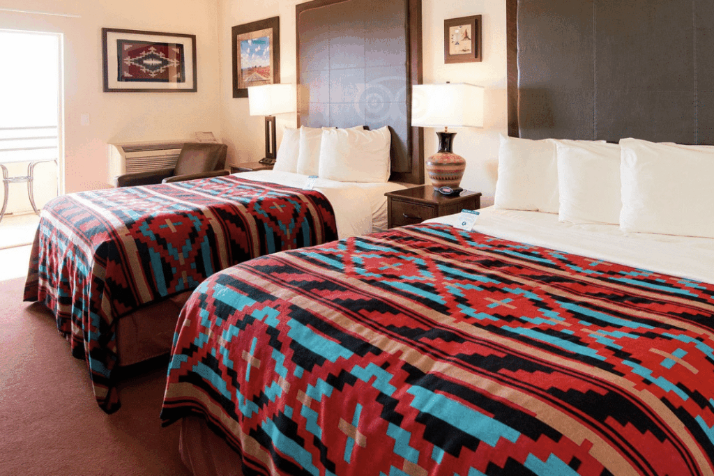 A double bedroom with Navajo print bedspreads at the View Hotel