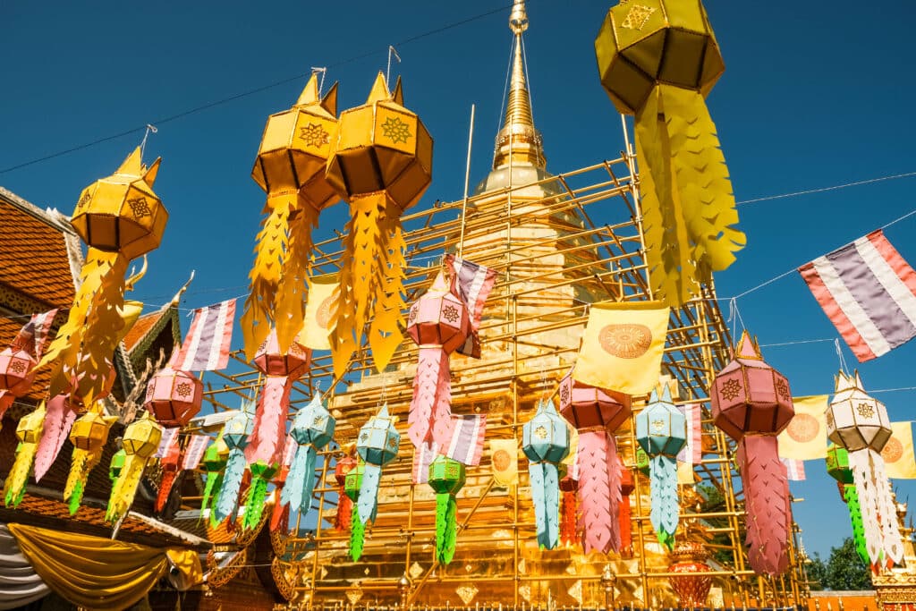 Colorful paper lanterns and golden chedi at Doi Suthep temple