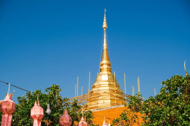 Golden stupa of Wat Phra That Doi Suthep gleaming in sunlight