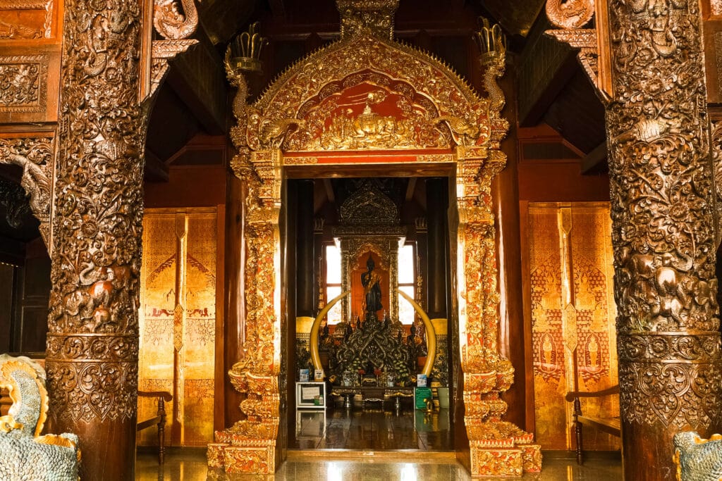 Gilded shrine and altar inside Doi Suthep’s inner sanctum