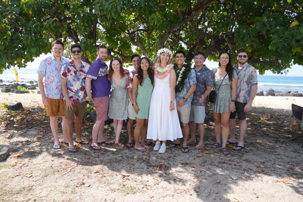 Smiling guests at a post elopement party