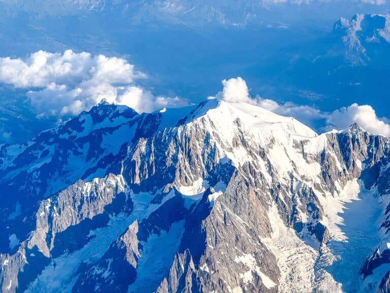 An aerial view of the Mont Blanc Massif, cloaked in snow, and the birthplace of modern Alpinism.