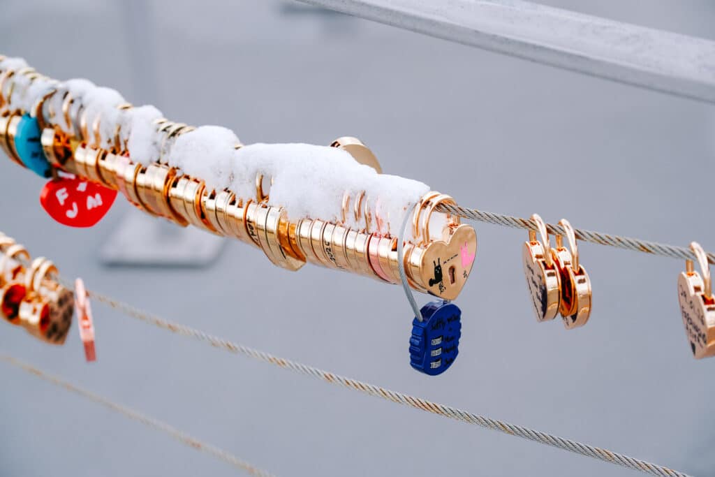 Vending machine selling heart-shaped love locks at Mt. Moiwa (reflections in the glass).
