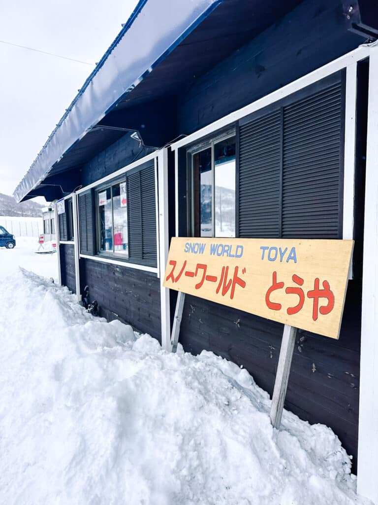 Snow World Toya shop exterior covered in fresh snow near Lake Toya, Hokkaido