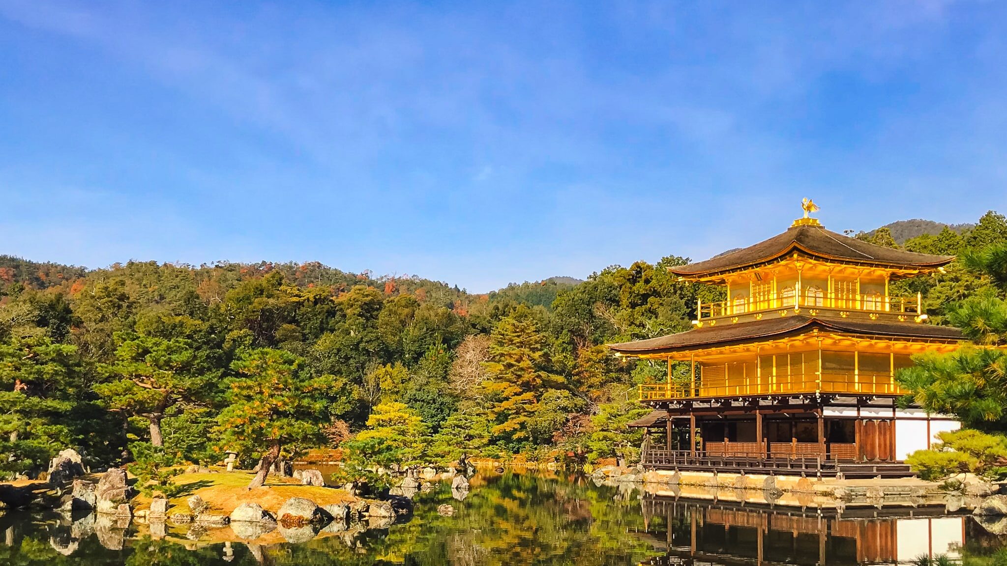 Kinkakuji Golden Pavilion surrounded by autumn foliage, Kyoto