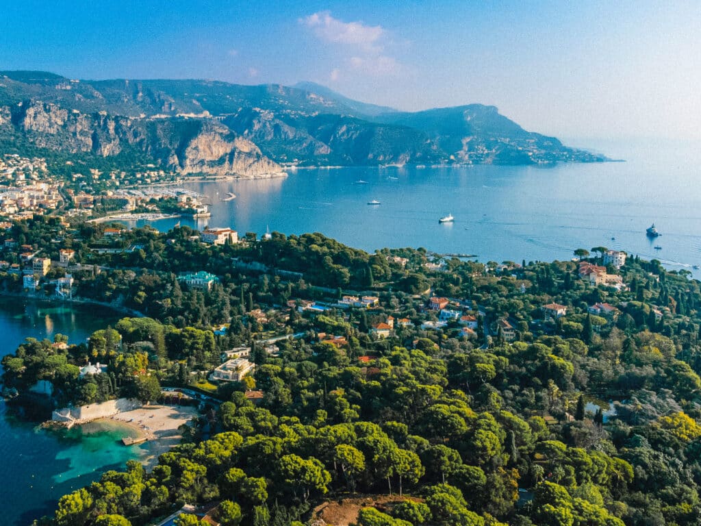 Aerial view of Saint-Jean-Cap-Ferrat coastline with turquoise water and lush peninsula