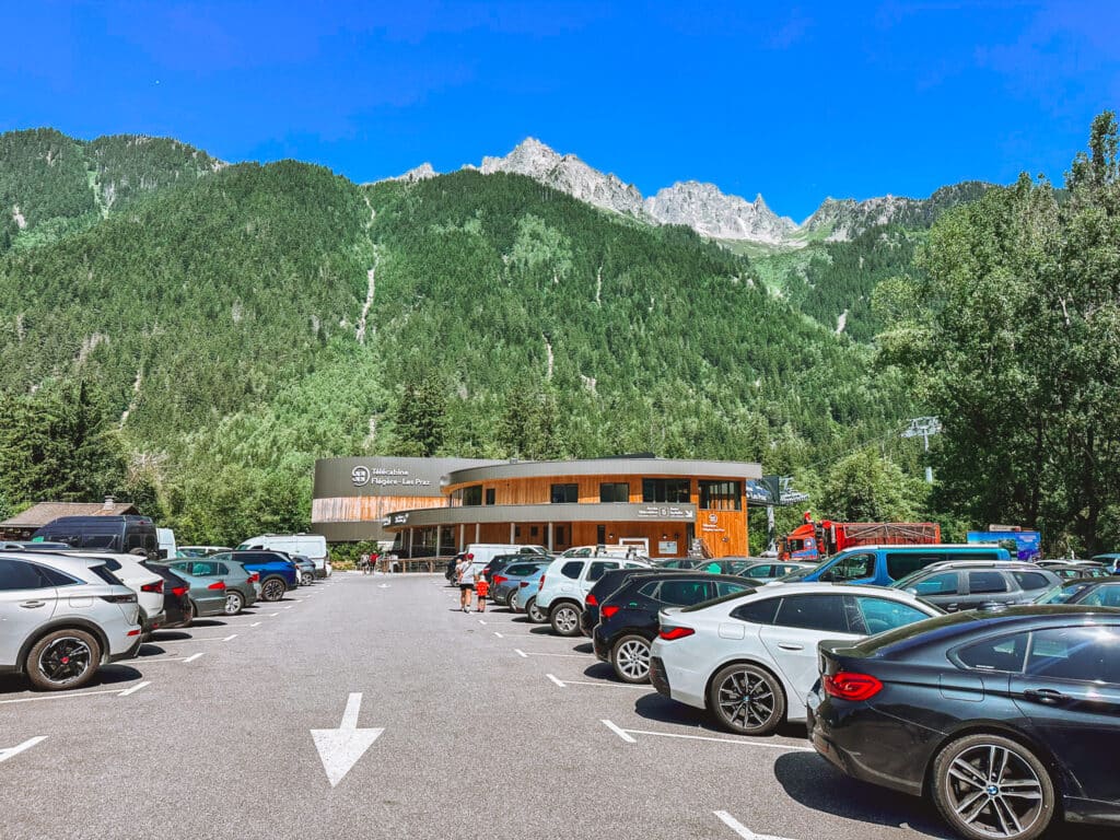 Parking lot at the La Flégère cable car base in Les Praz, the starting point for the Lac Blanc hike in Chamonix