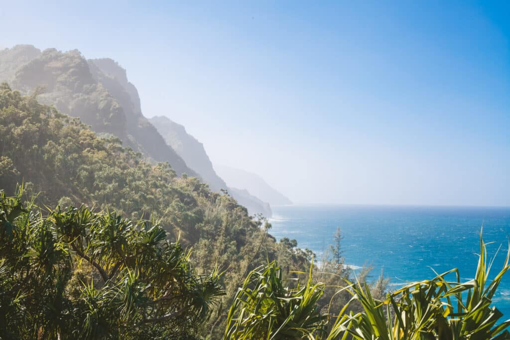 Sweeping view of the Nā Pali Coast cliffs and blue Pacific from the Kalalau Trail, Hāʻena State Park, Kauaʻi